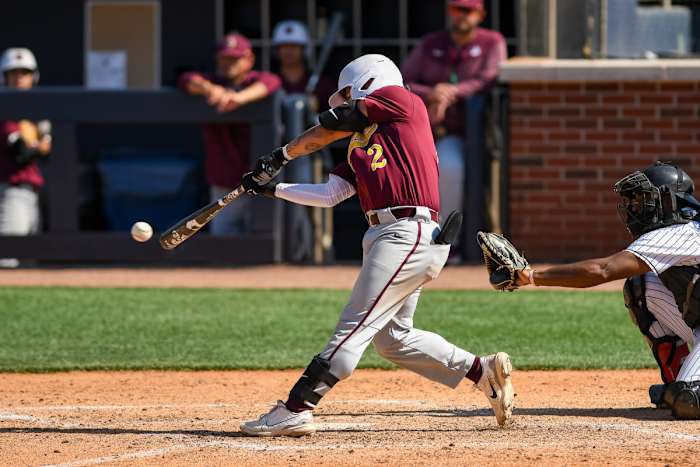 Bethune-Cookman's Colton Olasin puts the ball in play against Grambling State